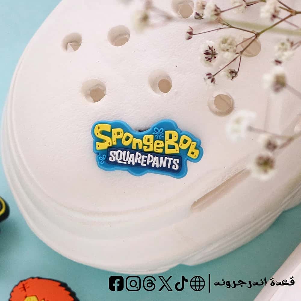 MRy4d1vZsViRuUdQaPMjCXzHkZEjjvh67GBPFJw4.jpg SpongeBob SquarePants logo- crocs charms - الصورة 1